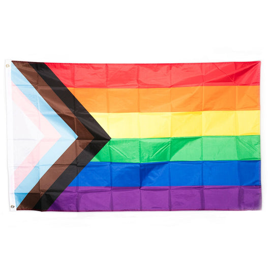 Full Sized Progressive Pride Flag. Featuring an additional five-colored chevron the Progressive Flag emphasizes inclusion and progression. The flag’s black and brown colors represent LGBTQ+ people of color and the colors pink light blue and white represent the transgender community.